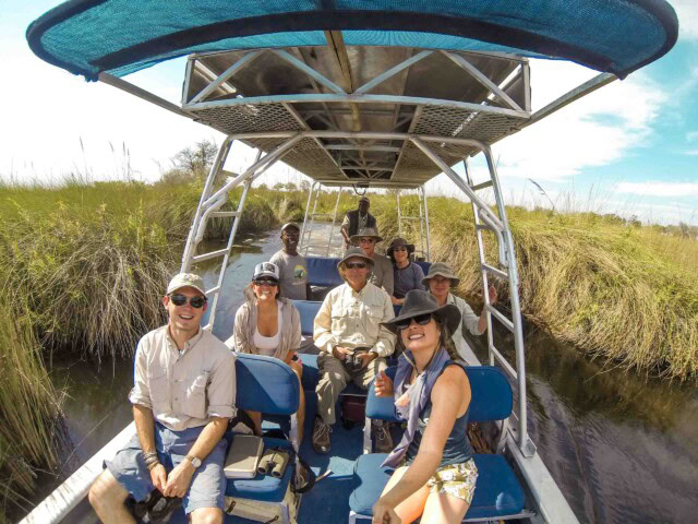 A group of travelers on a boat, guided through an unforgettable tour.
