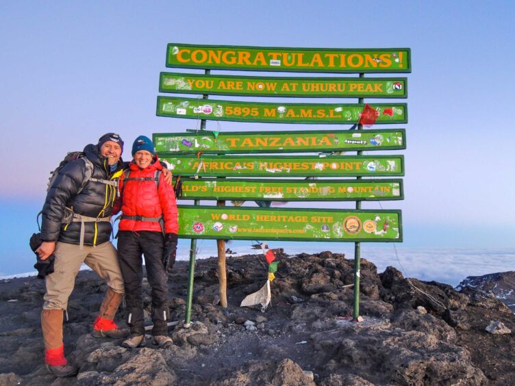 A couple at Uhuru peak.